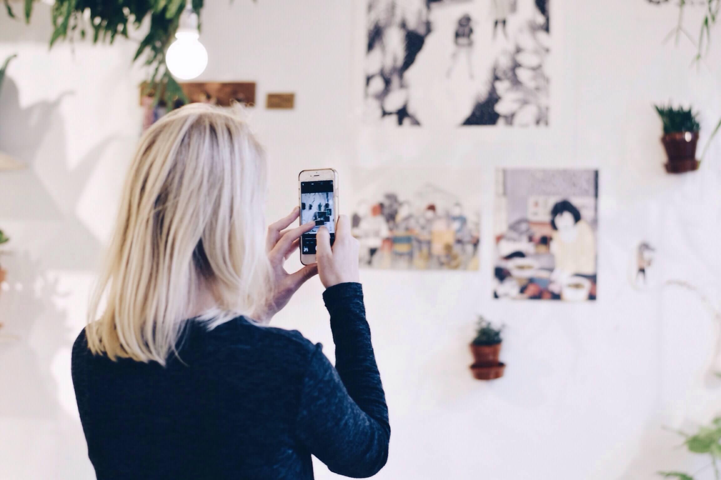 Woman making a video on smartphone