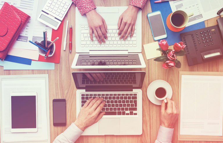 Aerial view of shared desk workspace