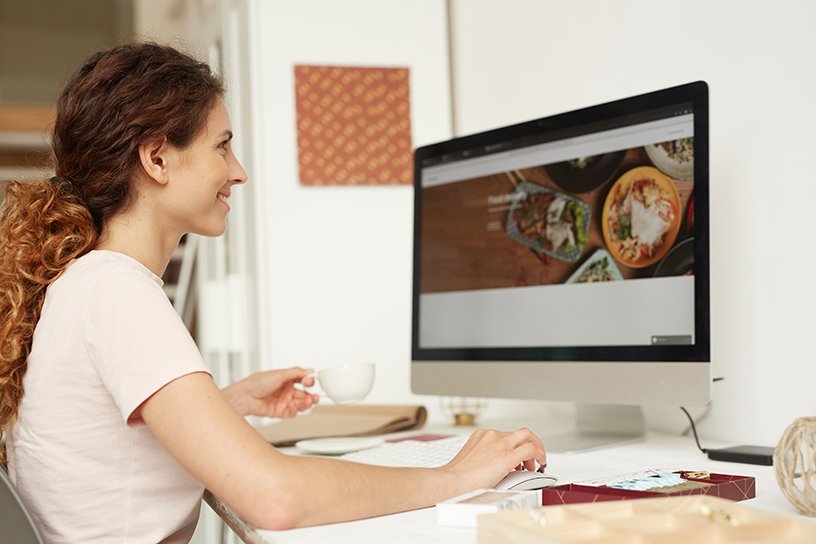 Web designer working on website by seventyfourimages