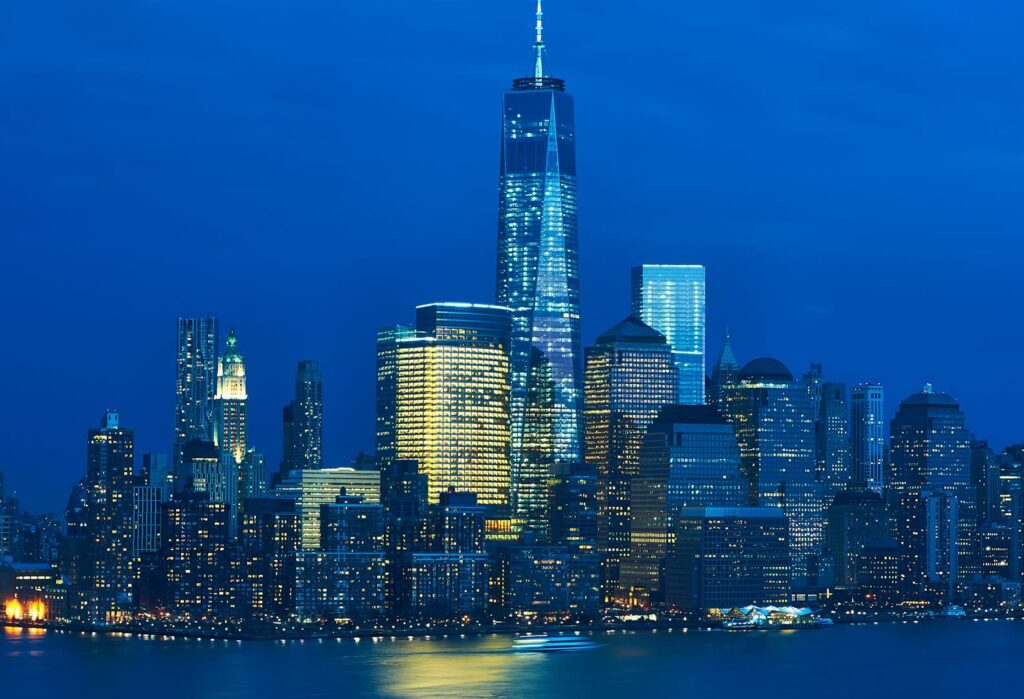 New York City Manhattan skyline with One World Trade Center Tower (AKA Freedom Tower) over Hudson River viewed from New Jersey