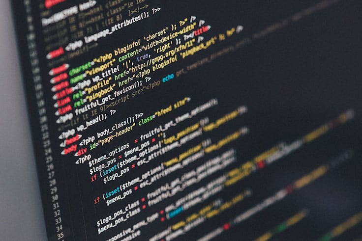 web development coding on a black screen