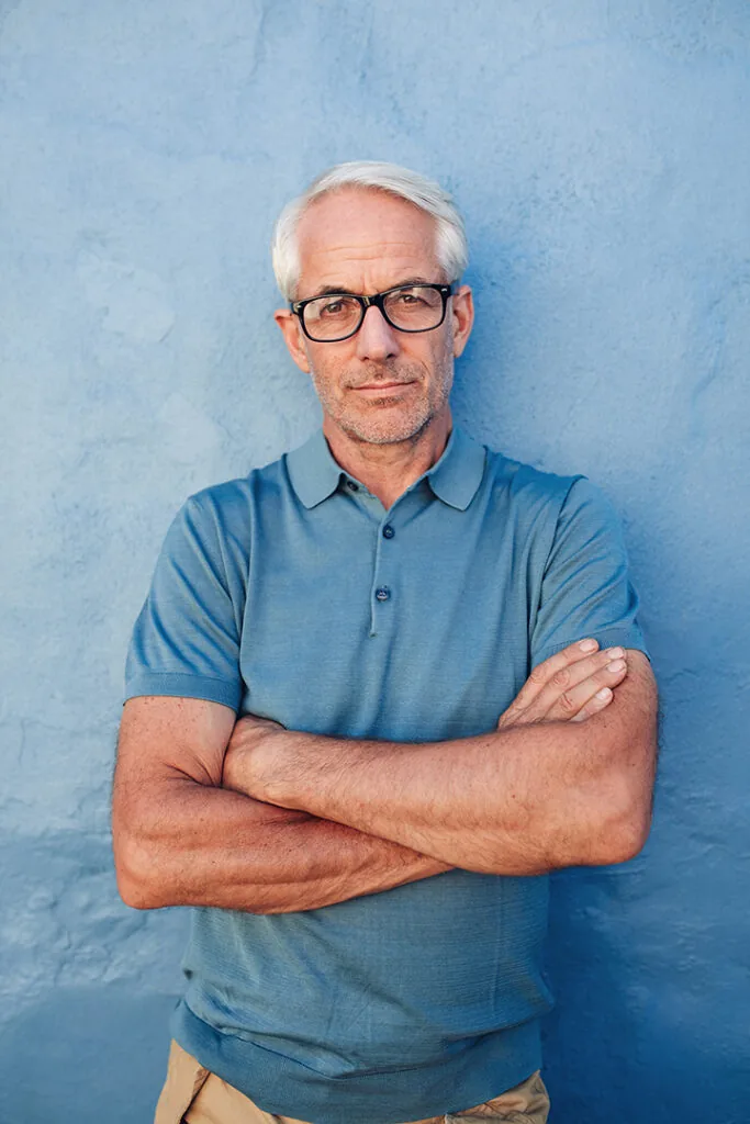 Caucasian man wearing glasses staring at camera by jacoblund
