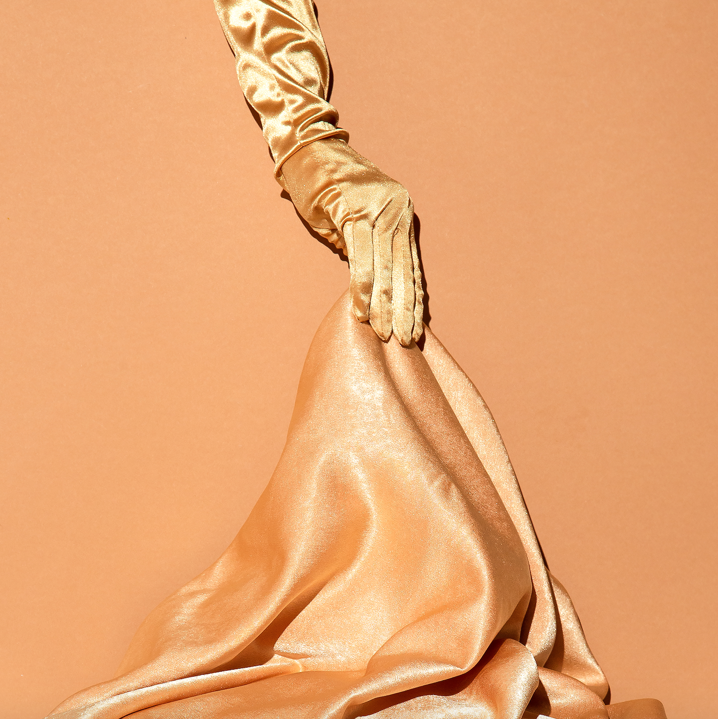 Monochromatic Product Photography - Neutral Color Palettes - Hand in golden gloves by EvgeniyaPorechenskaya